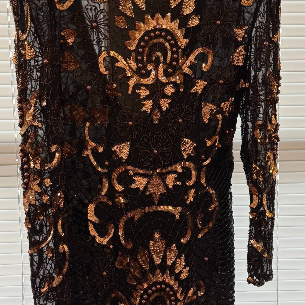 Elegant, black and gold silk formal dress with beads and sequins. Size Small.